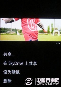 打开一张图片右小脚菜单中可以找到设为壁纸